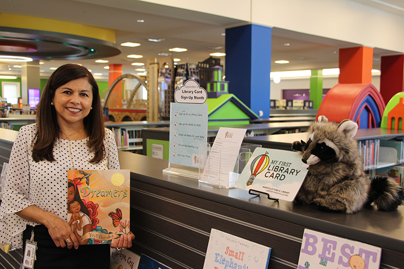 Pat Bashir with "Dreamers," one of her Top 5 Children's Books.