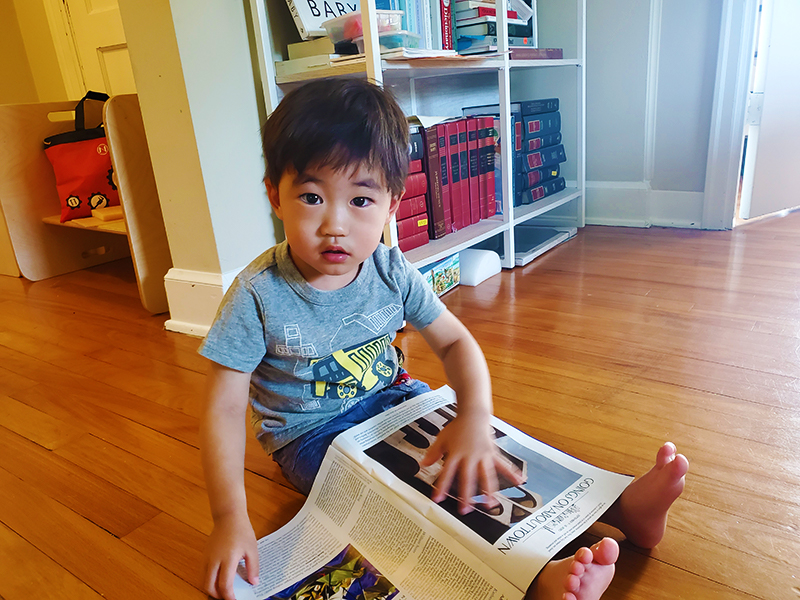 Ray reading on the floor.