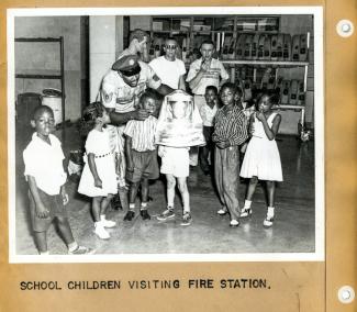 From the Fire Dept. scrapbooks, students visiting Fire Hall in 1959.